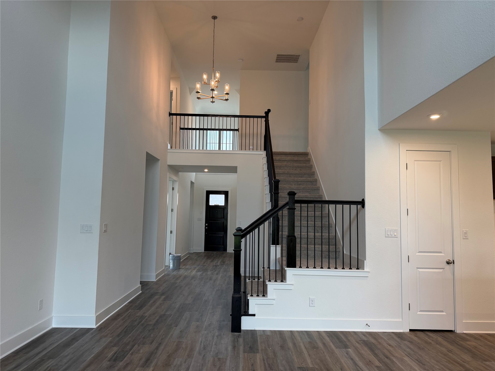 405 Texas Drive Georgetown, TX 78628 - Photo 2 of 18 From Family Room with soaring ceiling to Entry Foyer of Home