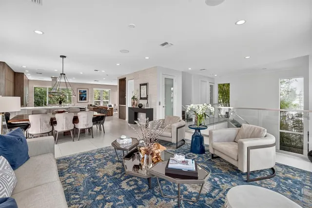 a kitchen with stainless steel appliances granite countertop a stove and a refrigerator