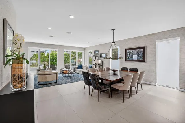 a view of entryway and workspace with wooden floor and a potted plant