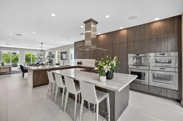 a bedroom with a large bed and a flat screen tv