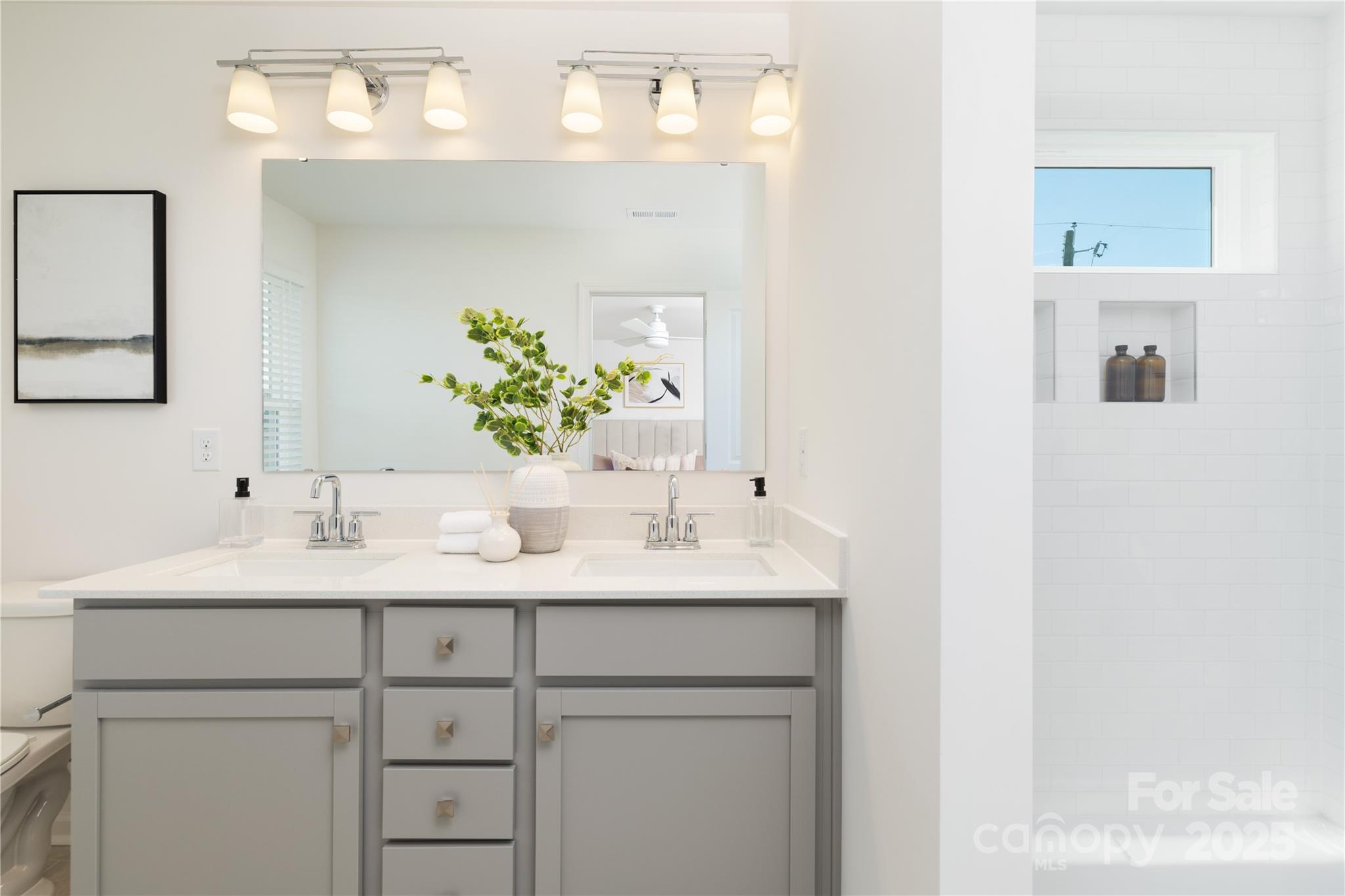 32562 B Millingport Road, Unit 7155 New London, NC 28127 - Photo 18 of 28 a bathroom with a sink and a mirror