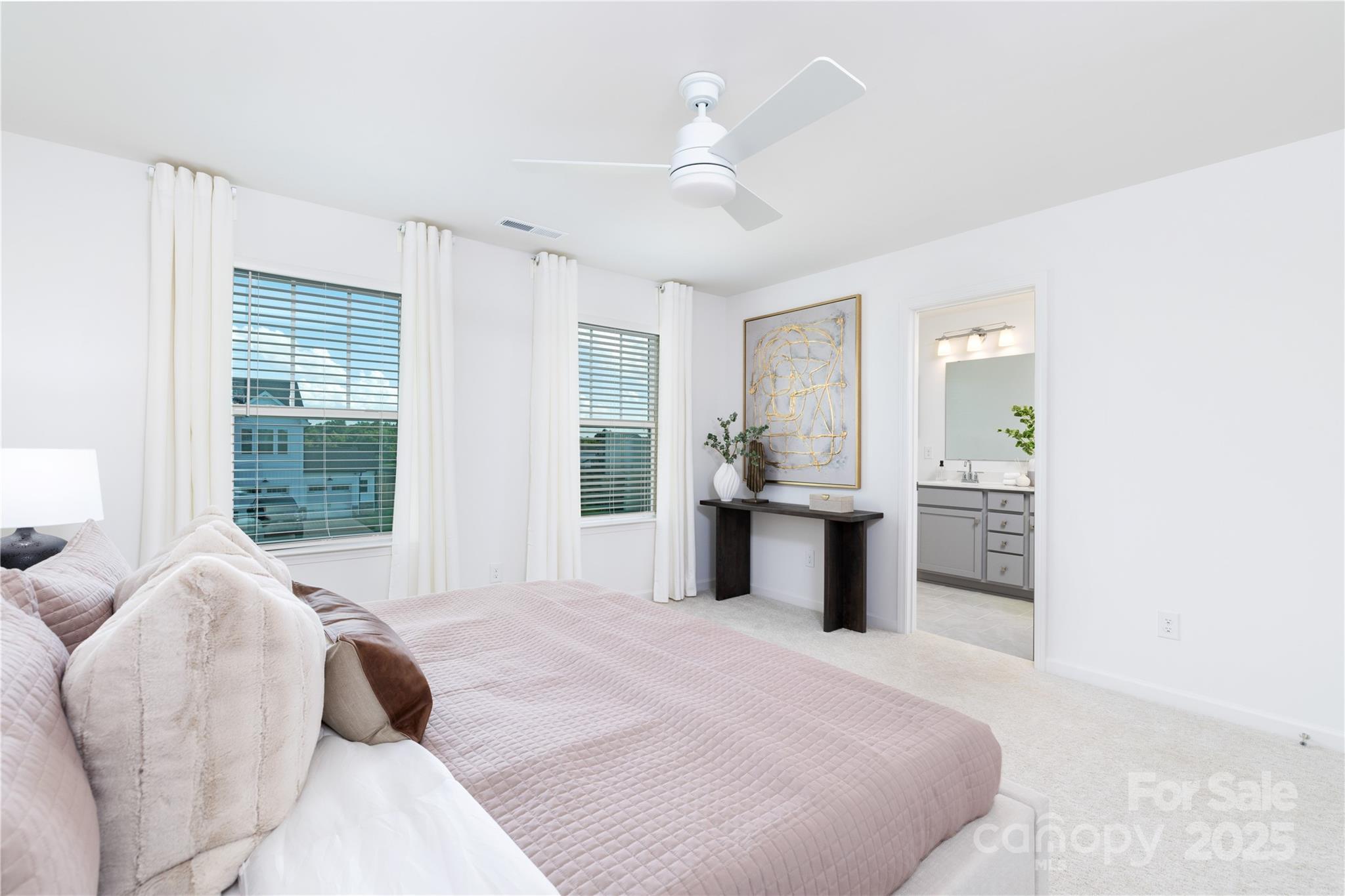 32562 B Millingport Road, Unit 7155 New London, NC 28127 - Photo 20 of 28 a spacious bedroom with a large bed and a dresser