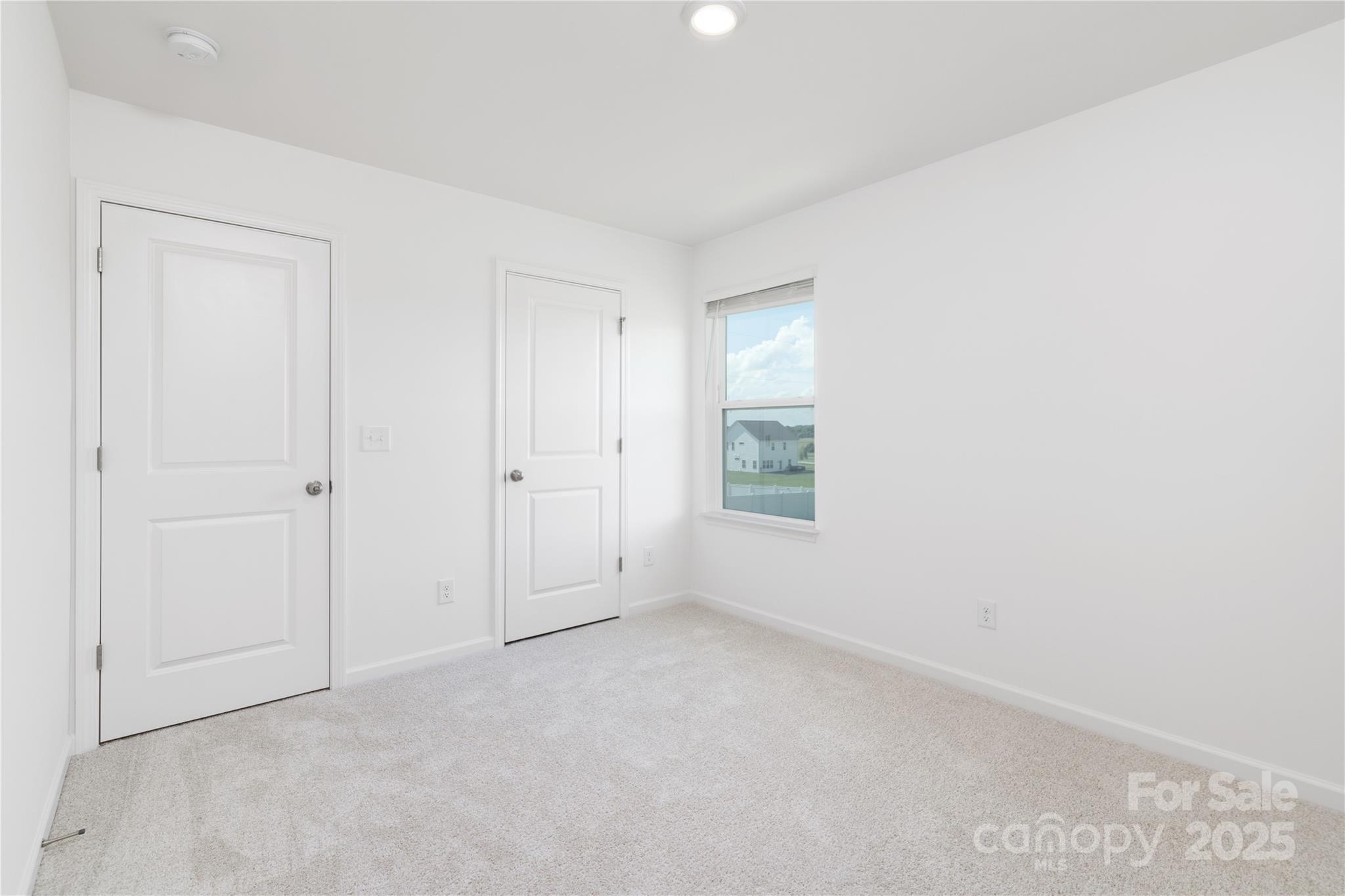32562 B Millingport Road, Unit 7155 New London, NC 28127 - Photo 22 of 28 an empty room with a window