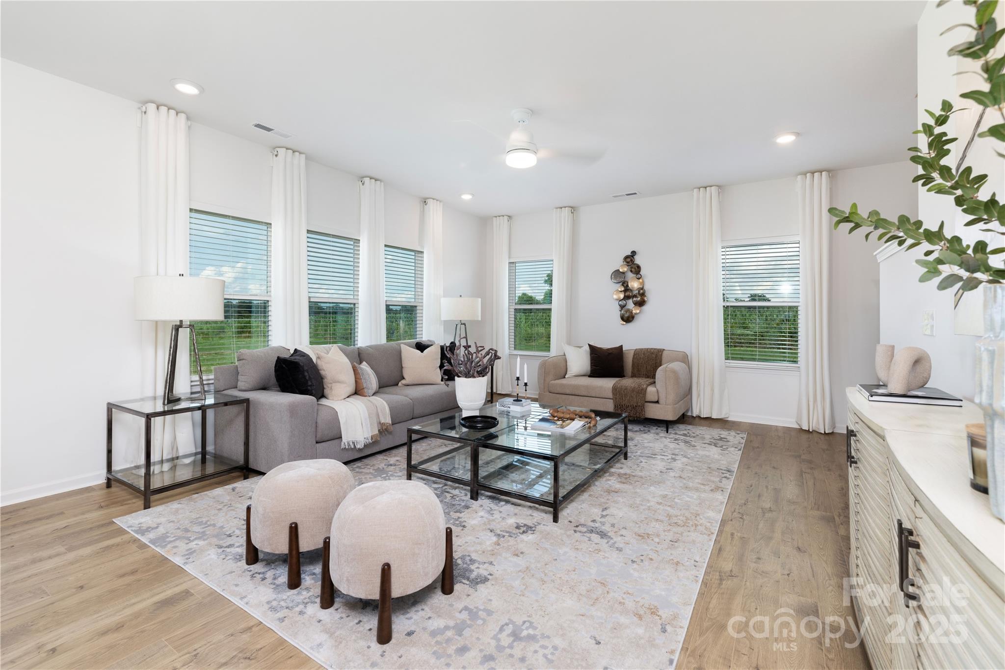 32562 B Millingport Road, Unit 7155 New London, NC 28127 - Photo 9 of 28 a living room with furniture and a large window