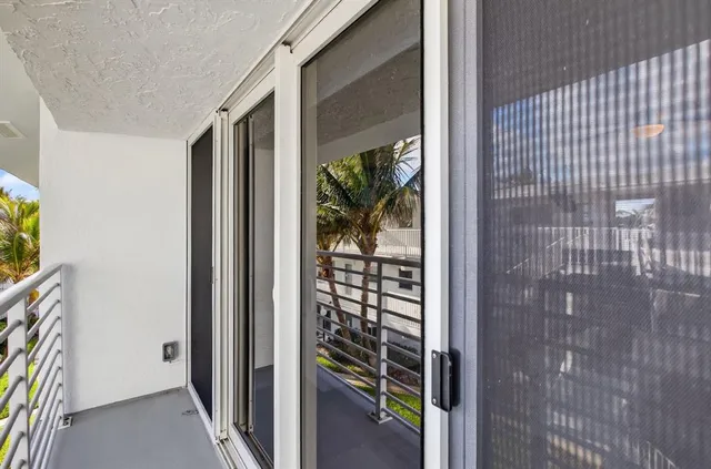 a view of a bathroom from a door