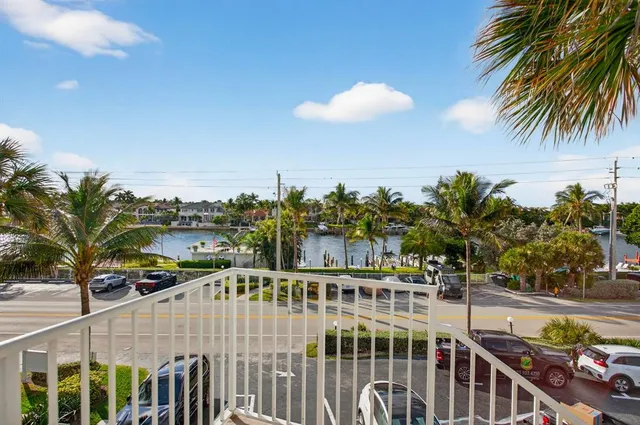 a view of a balcony with city view