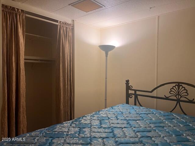 747 East Germann Road, Unit 64 San Tan Valley, AZ 85140 - Photo 14 of 18 a bedroom with a bed and a table