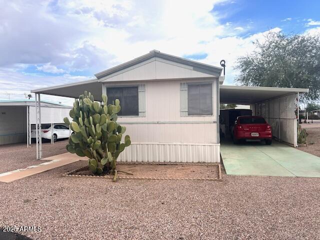 747 East Germann Road, Unit 64 San Tan Valley, AZ 85140 - Photo 17 of 18 a view of a house with a garden