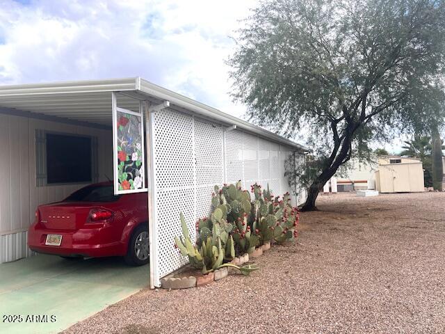 747 East Germann Road, Unit 64 San Tan Valley, AZ 85140 - Photo 6 of 18 a view of a house with a cars park side of a road