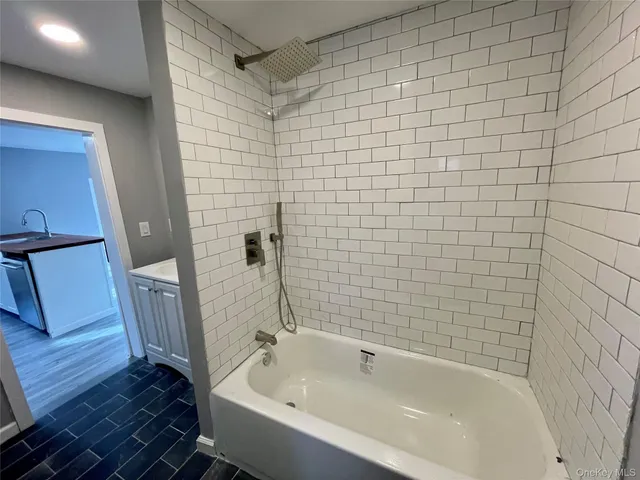 a bathroom with a bathtub
