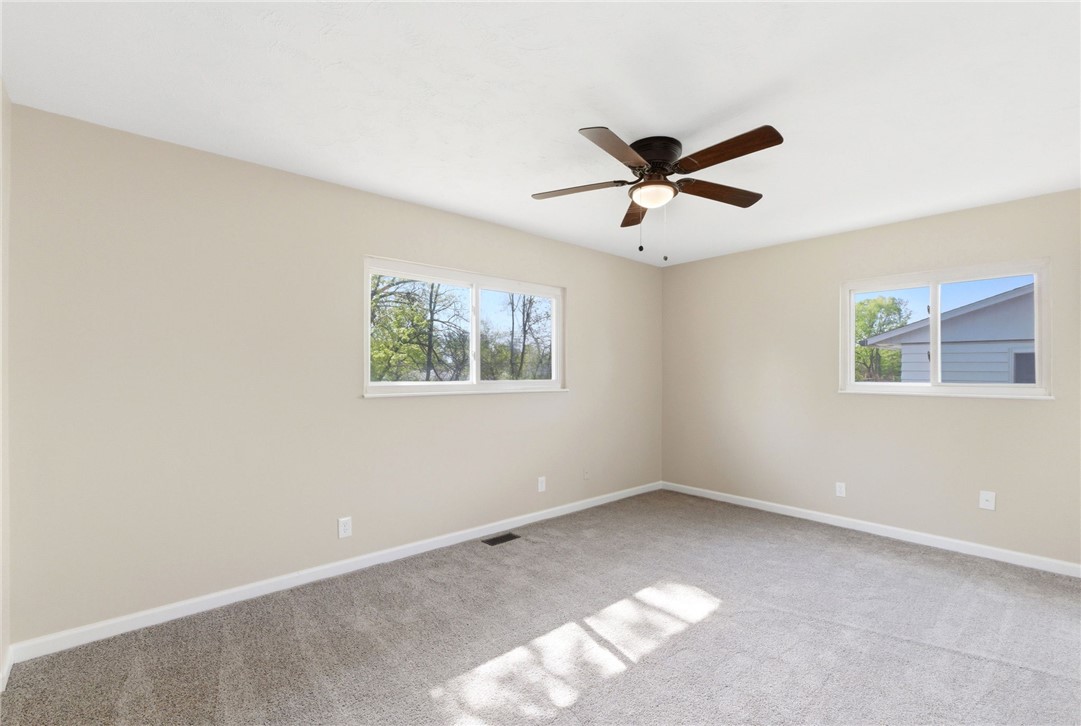 40 Woods Road Springboro, OH 45066 - Photo 39 of 57 This airy bedroom offers a peaceful retreat with ample natural light.