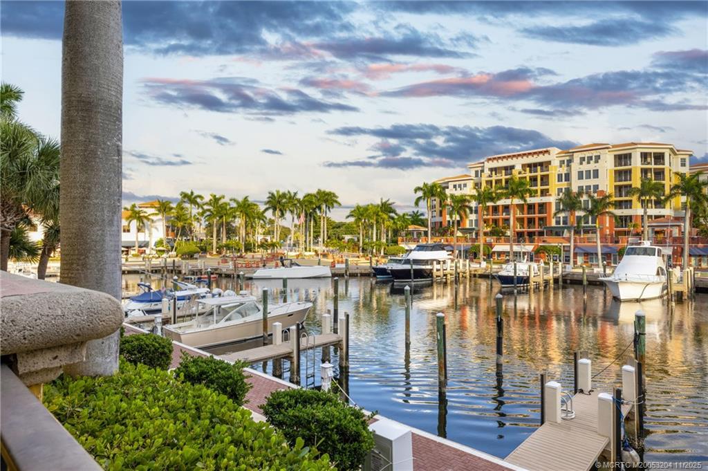 340 Highway 1, Unit 101 Jupiter, FL 33477 - Photo 6 of 42 a balcony with chairs and ocean view