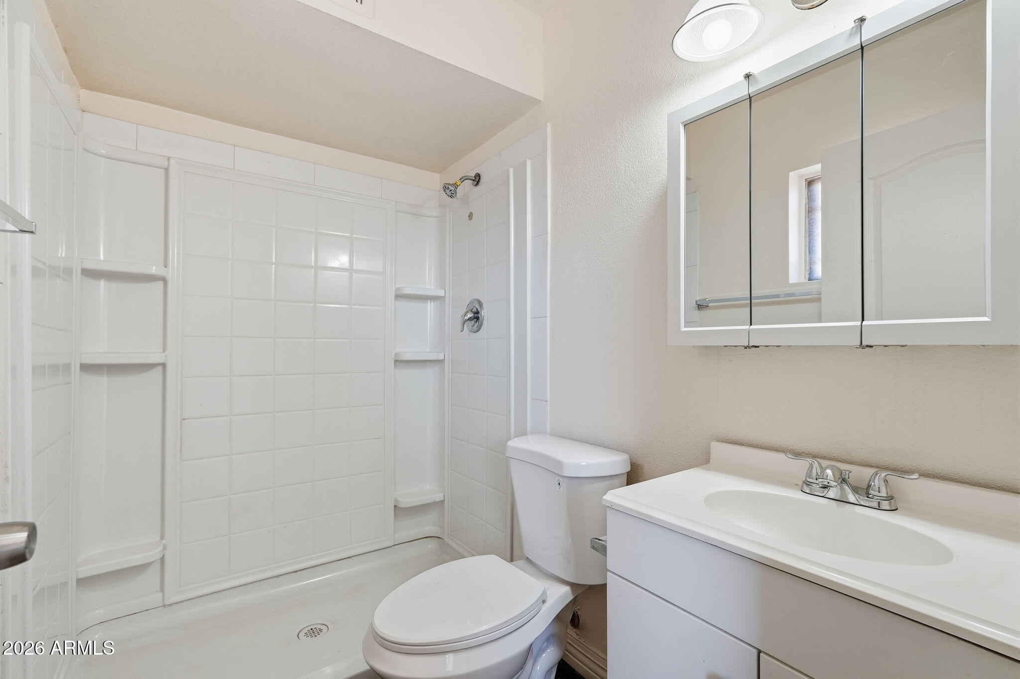 6452 West Thomas Road Phoenix, AZ 85033 - Photo 22 of 30 a bathroom with a sink a toilet and shower