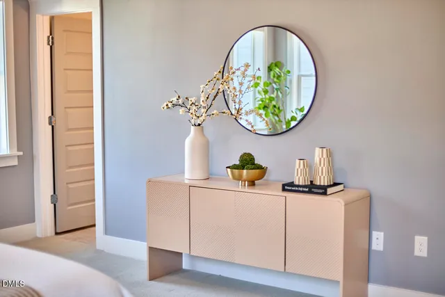 a bathroom with a sink double vanity and a mirror