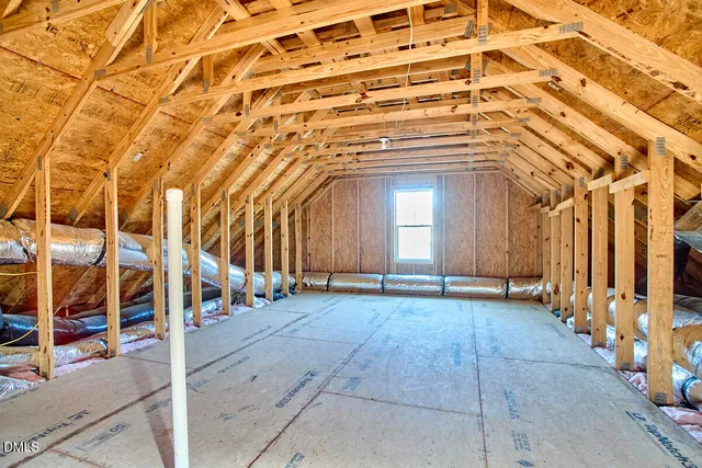 a view of a bedroom from the hallway