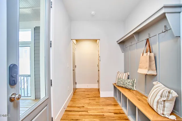 a view of a balcony with wooden floor