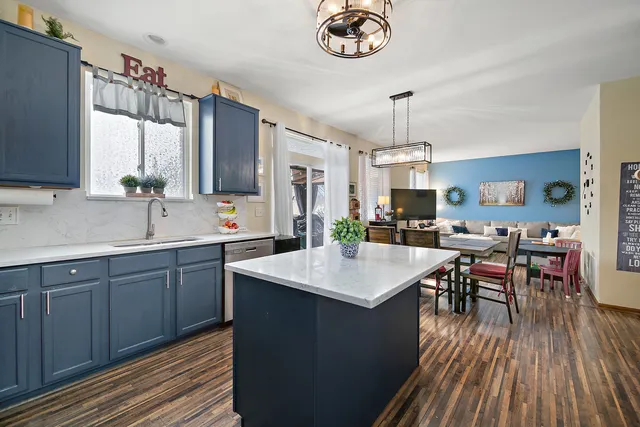 a large kitchen with a large island in it