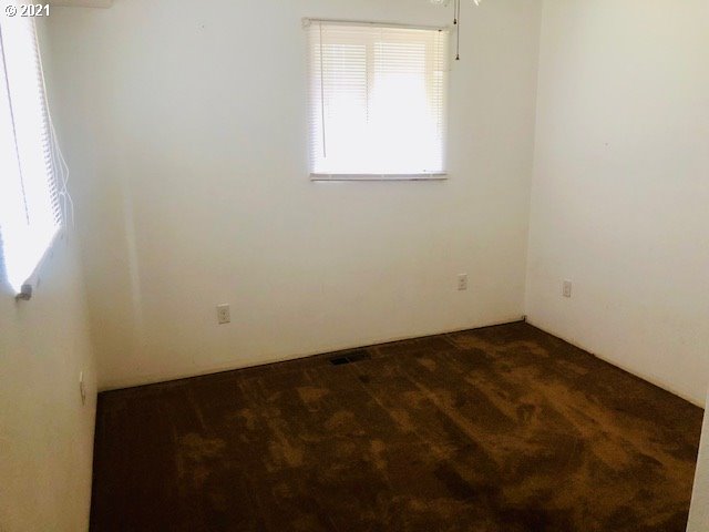 311 Panda Road Washougal, WA 98671 - Photo 18 of 21 an empty room with a window