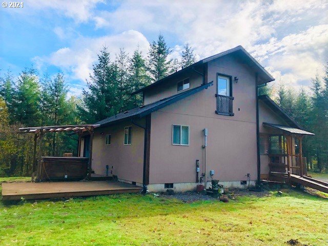 311 Panda Road Washougal, WA 98671 - Photo 2 of 21 a house with a yard