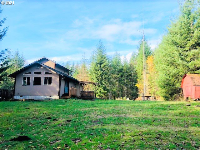 311 Panda Road Washougal, WA 98671 - Photo 5 of 21 a front view of house with garden