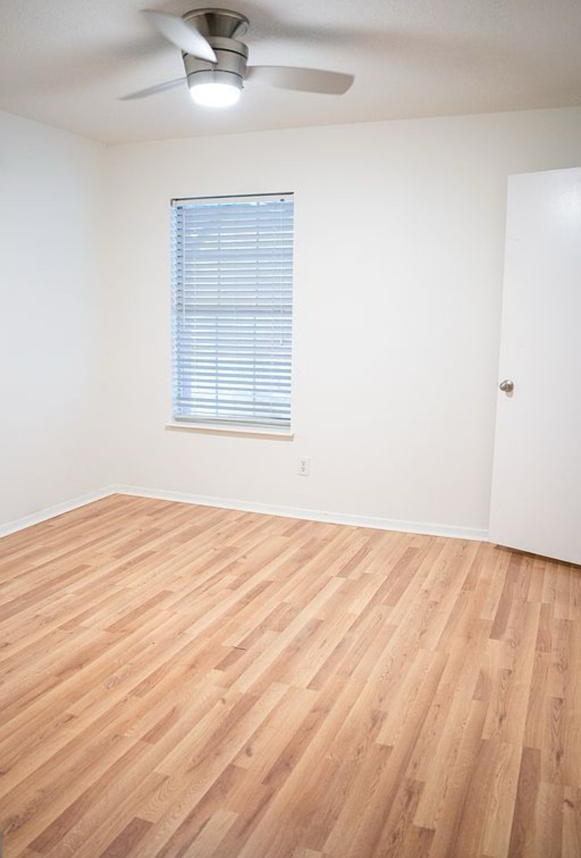 2841 San Gabriel Street Austin, TX 78705 - Photo 11 of 25 Empty room featuring light wood finished floors and ceiling fan