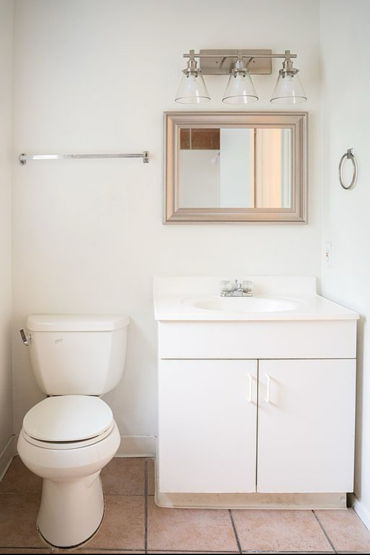 2841 San Gabriel Street Austin, TX 78705 - Photo 15 of 25 Half bath featuring vanity and light tile patterned flooring