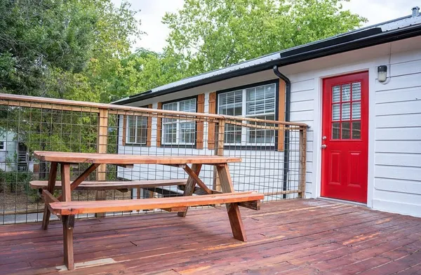 a house view with outdoor seating space