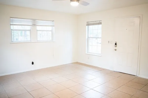 an empty room with windows