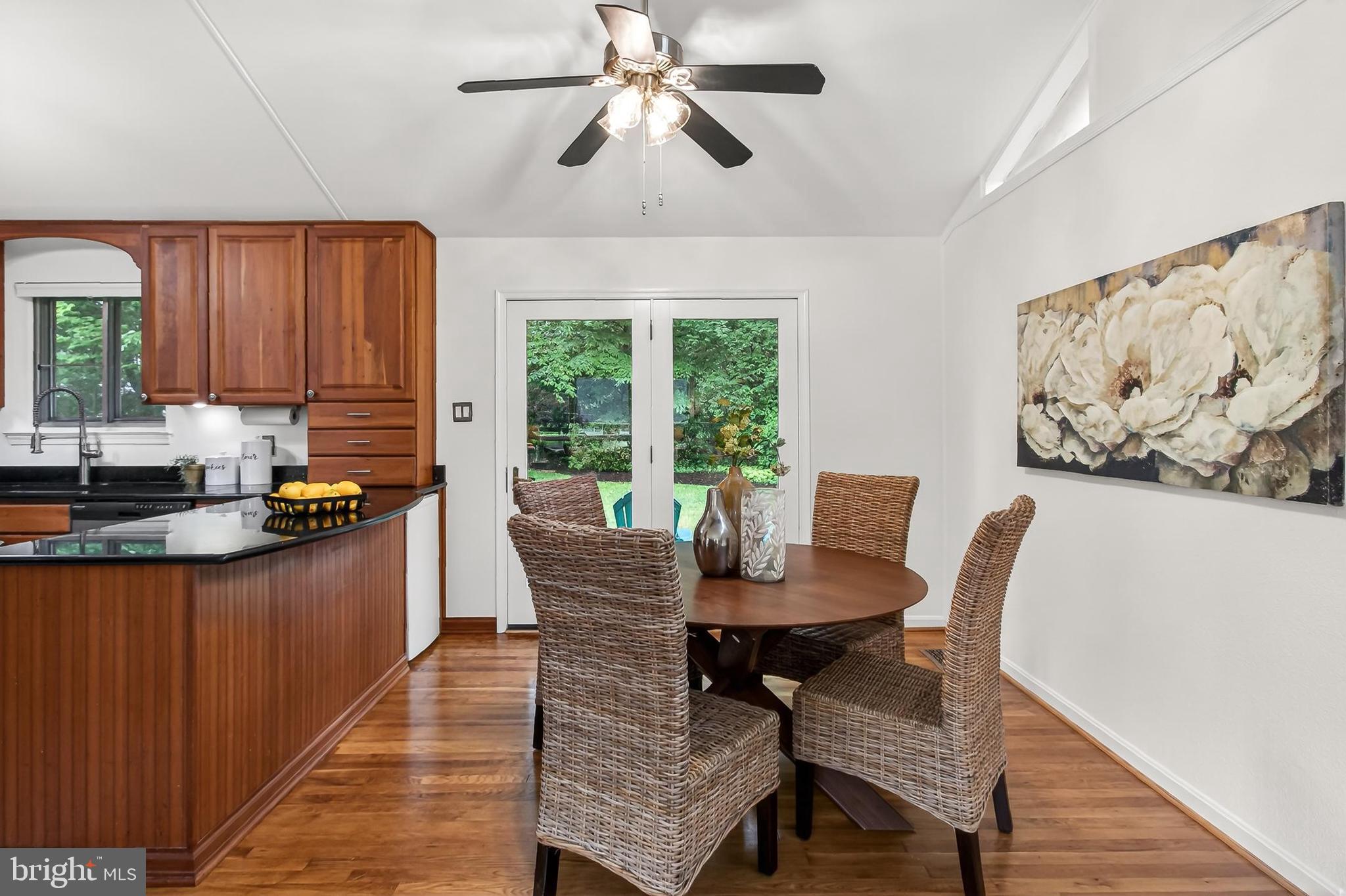 5502 Kempton Drive Springfield, VA 22151 - Photo 17 of 49 Dining room flows to yard, beverage fridge conveys