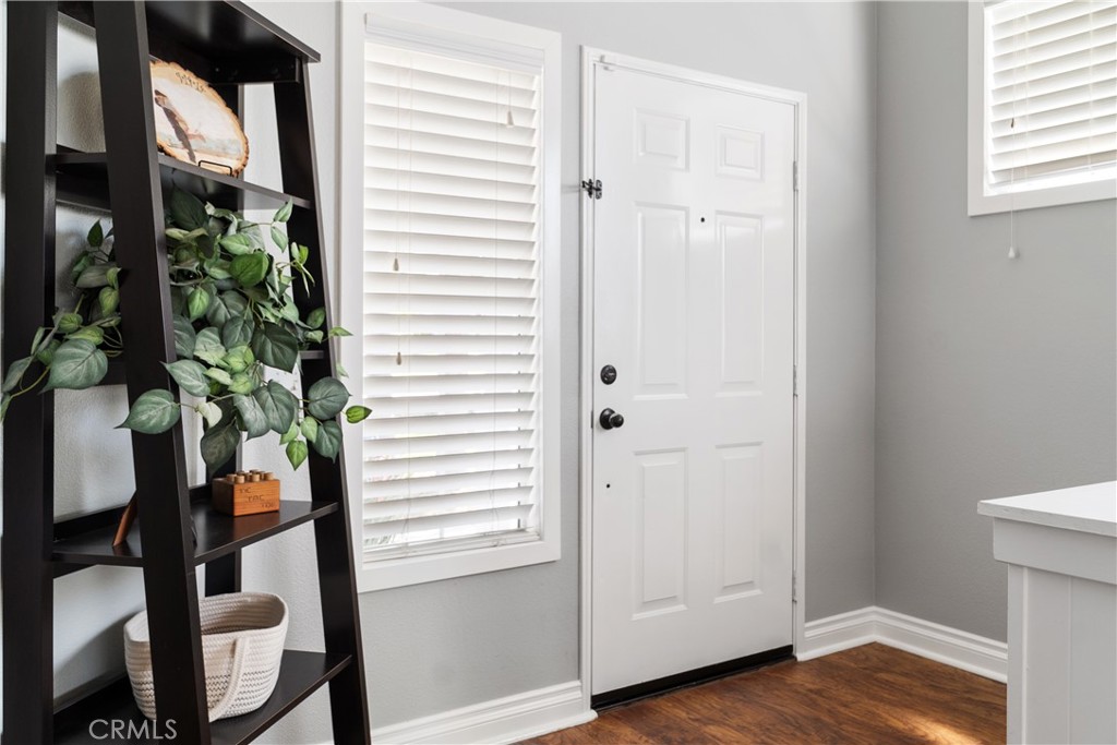 20808 Millbrook Street Riverside, CA 92508 - Photo 11 of 51 an entryway with wooden floor and windows
