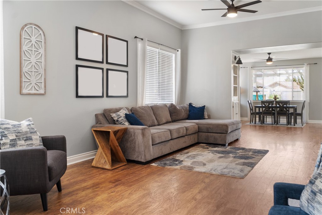 20808 Millbrook Street Riverside, CA 92508 - Photo 13 of 51 a living room with furniture and wooden floor