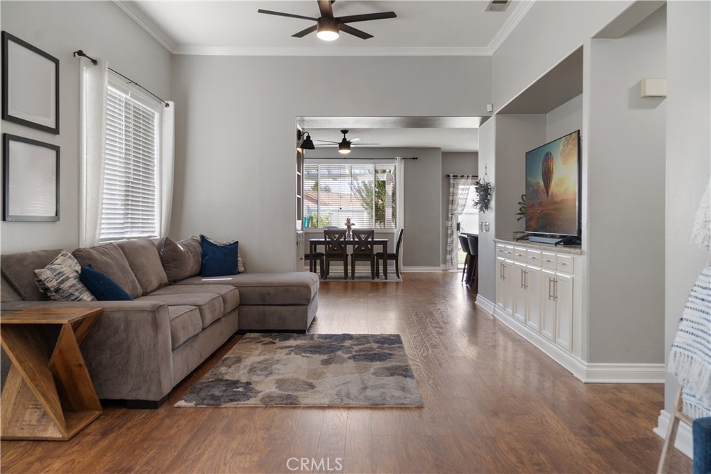 20808 Millbrook Street Riverside, CA 92508 - Photo 14 of 51 a living room with furniture and a flat screen tv