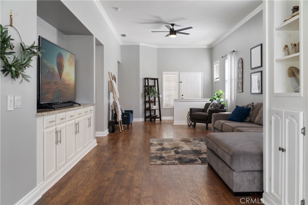 20808 Millbrook Street Riverside, CA 92508 - Photo 15 of 51 a living room with furniture and a flat screen tv
