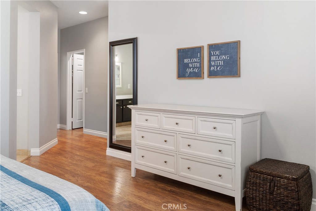 20808 Millbrook Street Riverside, CA 92508 - Photo 29 of 51 a bedroom with a bed and a dresser in it