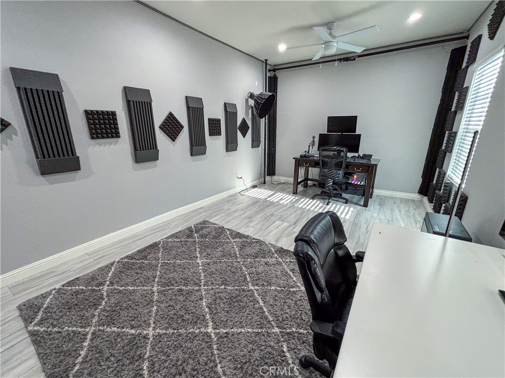 20808 Millbrook Street Riverside, CA 92508 - Photo 40 of 51 a view of a livingroom with workspace and a window