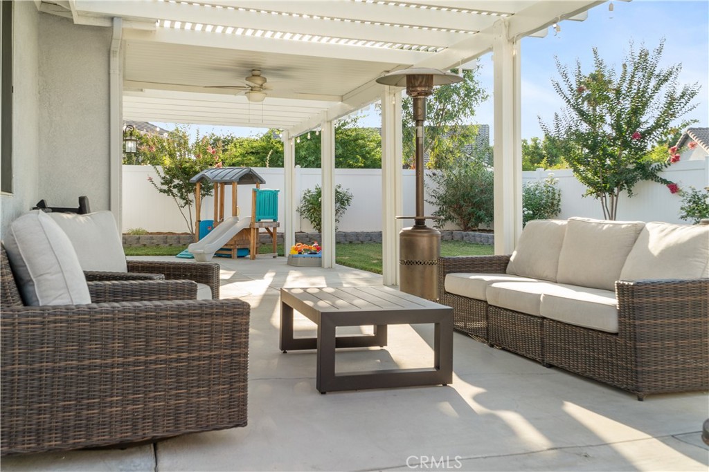 20808 Millbrook Street Riverside, CA 92508 - Photo 46 of 51 a living room with furniture and a potted plant