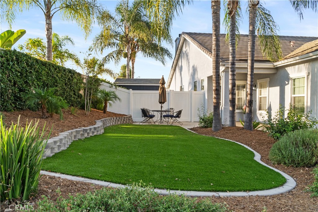 20808 Millbrook Street Riverside, CA 92508 - Photo 5 of 51 a view of a palm trees in front of a house