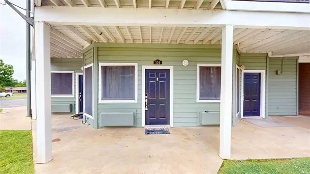 a view of house with outdoor space