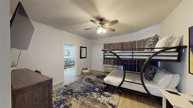 a work room with furniture and a chandelier