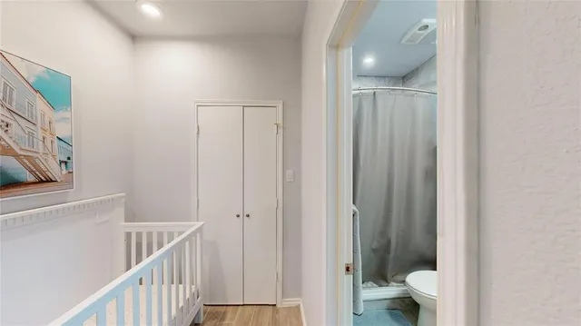 a view of a bathroom from the hallway