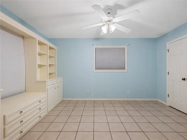 a view of a kitchen from the hallway