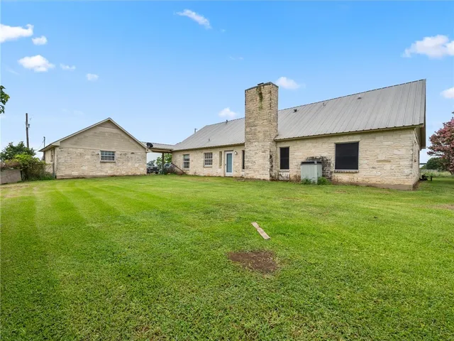 a picture of a counter top space with stainless steel appliances