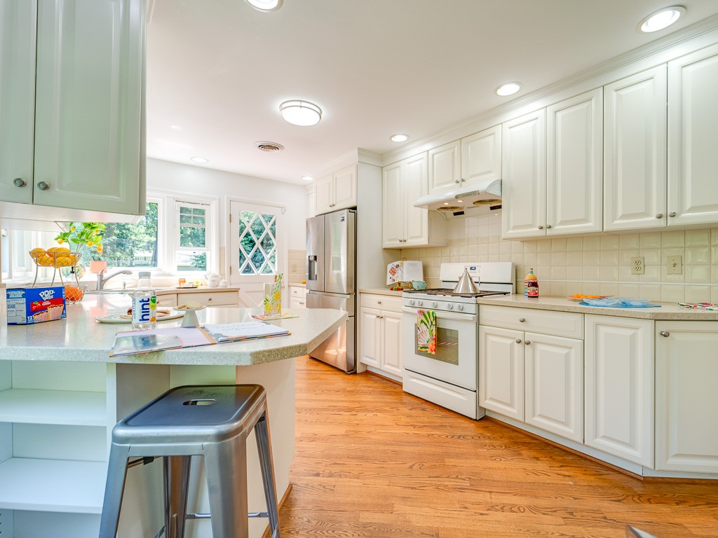 4 Tuxford Road Pittsford, NY 14534 - Photo 12 of 38 The heart of the home lies in the large kitchen, a