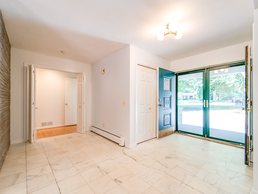 4 Tuxford Road Pittsford, NY 14534 - Photo 20 of 38 The entrance to the family wing is through large d