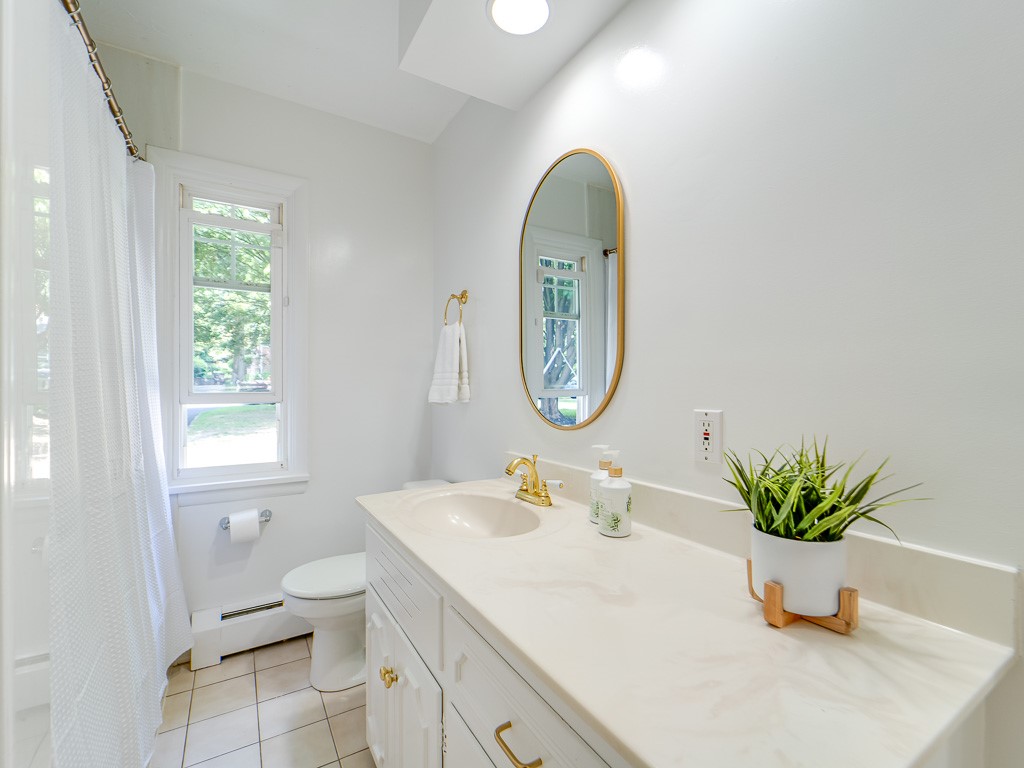 4 Tuxford Road Pittsford, NY 14534 - Photo 23 of 38 The sleek and sophisticated vanity designs accente