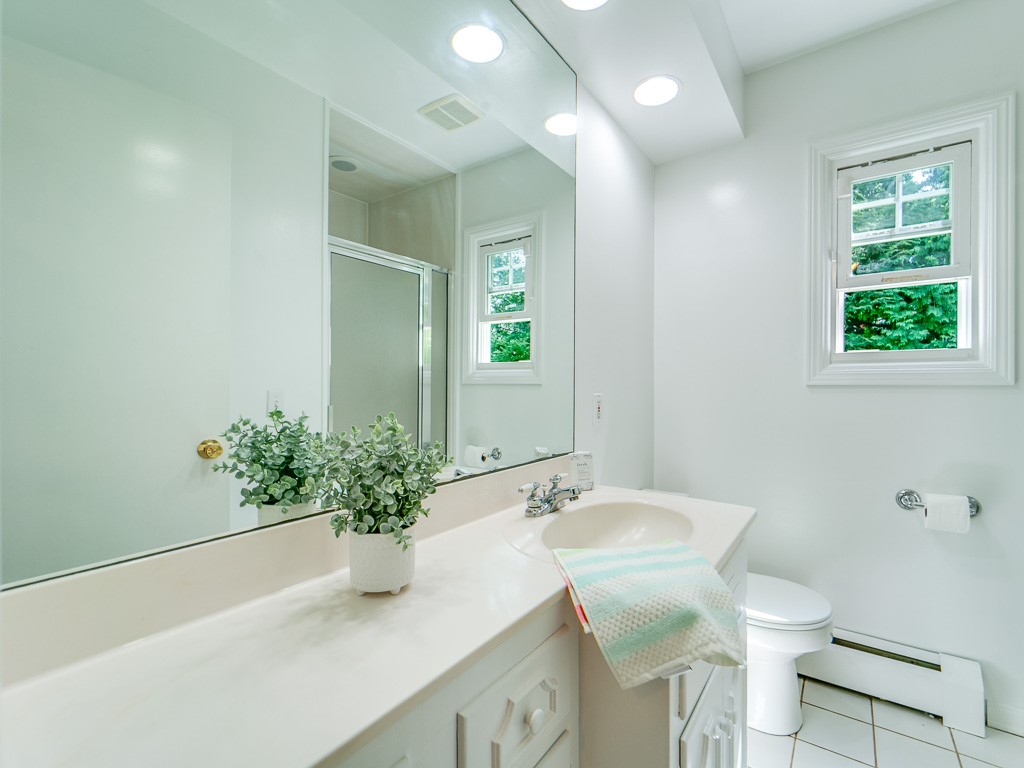 4 Tuxford Road Pittsford, NY 14534 - Photo 26 of 38 The family bath serves the three family bedrooms.