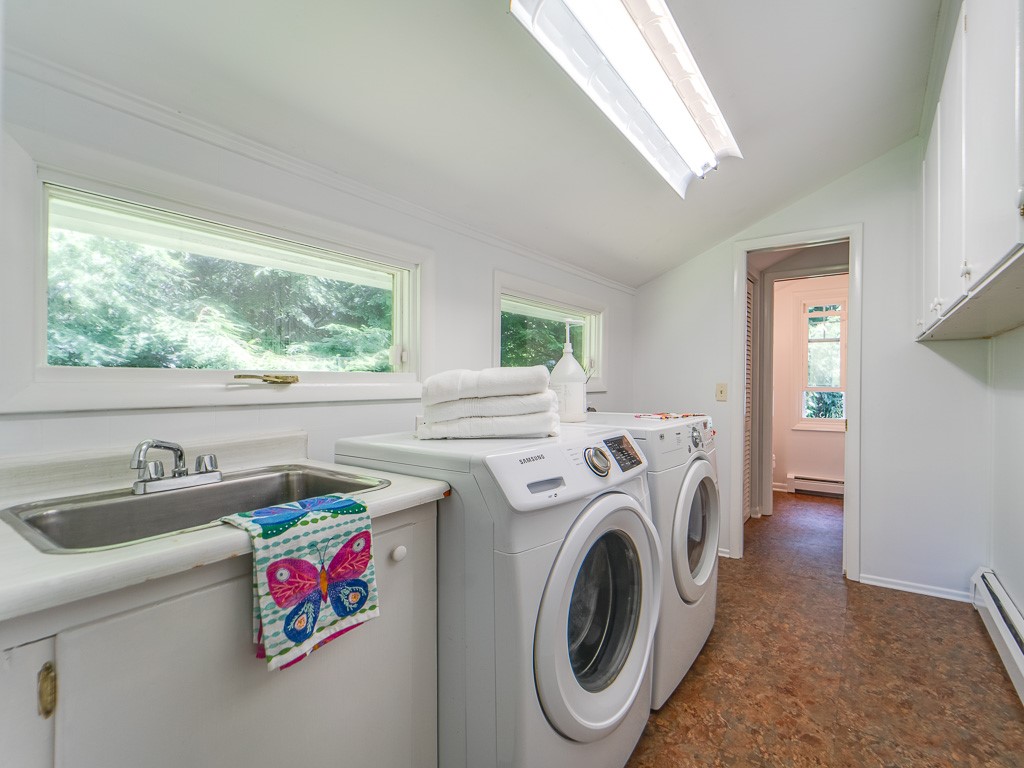 4 Tuxford Road Pittsford, NY 14534 - Photo 28 of 38 Bright and efficent first floor laundry area with