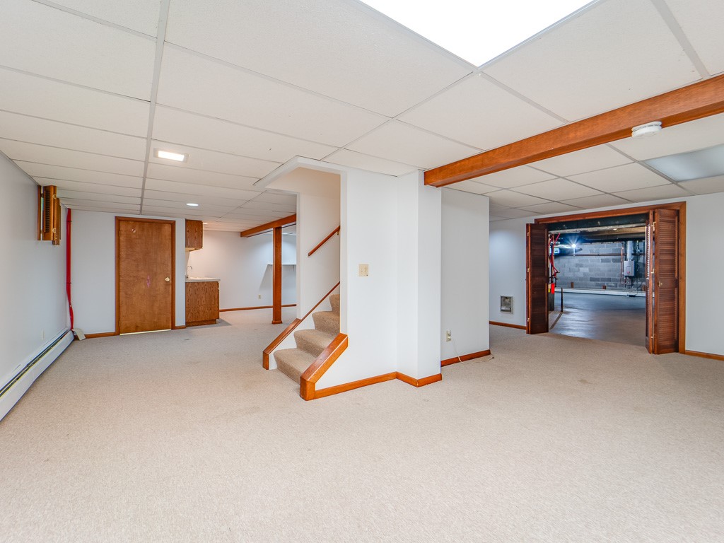 4 Tuxford Road Pittsford, NY 14534 - Photo 29 of 38 The lower level is expensive and offers numerous p