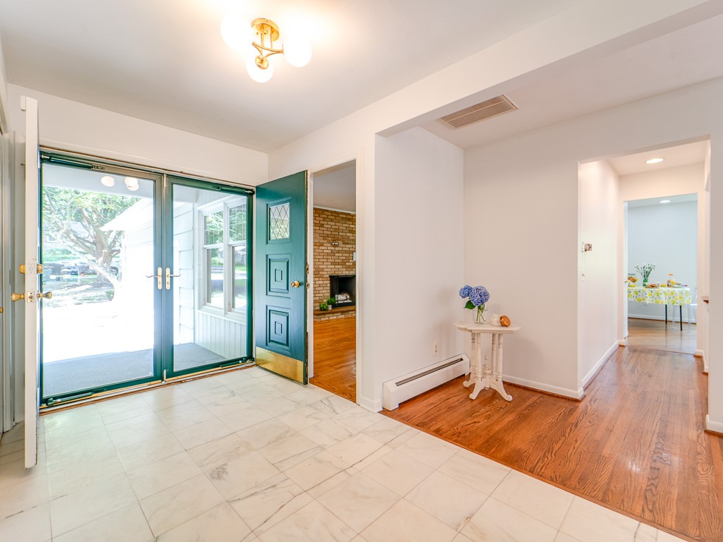 4 Tuxford Road Pittsford, NY 14534 - Photo 3 of 38 The front foyer features marble flooring, adding a