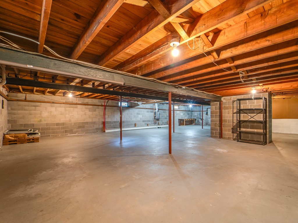 4 Tuxford Road Pittsford, NY 14534 - Photo 32 of 38 A massive unfinished area for storage or ready for